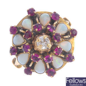 A cubic zirconia, ruby and opal dress ring.