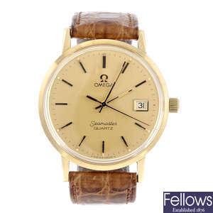 OMEGA - a gentleman's yellow metal Seamaster Quartz wrist watch.
