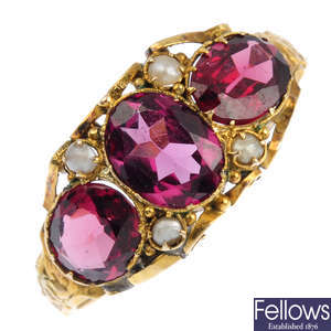 A mid Victorian 12ct gold garnet and seed pearl three-stone ring.