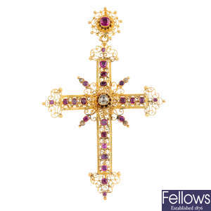A late Victorian gold, ruby and diamond cross pendant.
