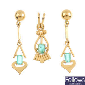 A pair of emerald earring and a pendant. 