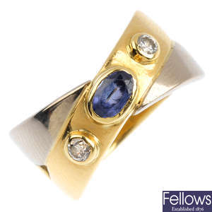 An 18ct gold sapphire and diamond three-stone band ring.