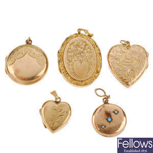 A 9ct gold locket, three 9ct front and back lockets and a pendant.