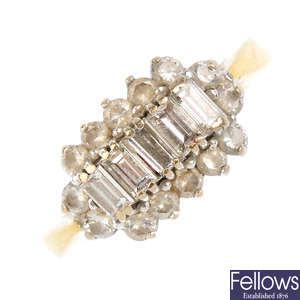 (61125) An 18ct gold diamond cluster ring.