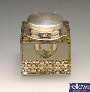 An Edwardian silver mounted square glass inkwell.