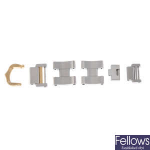 CARTIER - a group of assorted bracelet links and bracelet parts.