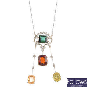 An early 20th century tourmaline, garnet, topaz and diamond necklace.