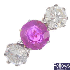 A Burma ruby and diamond three-stone ring.