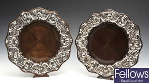 A pair of Edwardian silver mounted photograph frames.