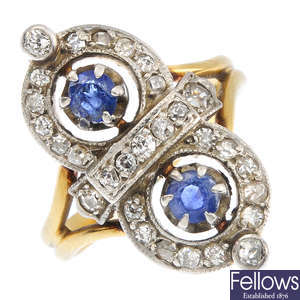 A mid 20th century platinum and 18ct gold sapphire and diamond dress ring.