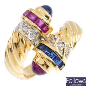 An 18ct gold sapphire, ruby and diamond dress ring.