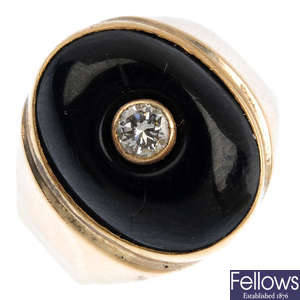 A 14ct gold onyx and diamond signet ring.