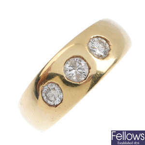 A 9ct gold diamond three-stone ring.