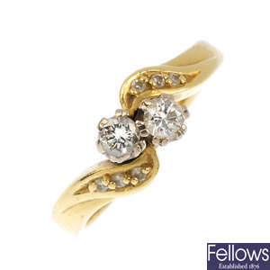 An 18ct gold diamond two-stone ring.