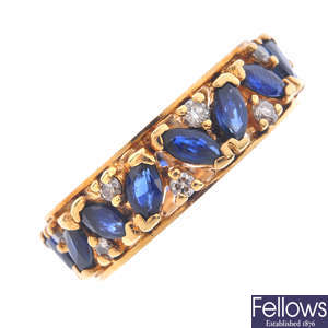 An 18ct gold sapphire and diamond full eternity ring.
