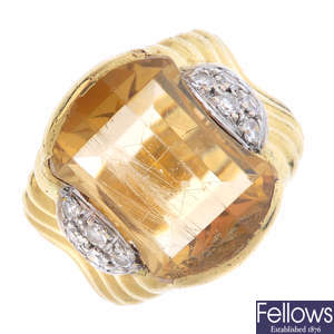 An 18ct gold citrine and diamond dress ring.