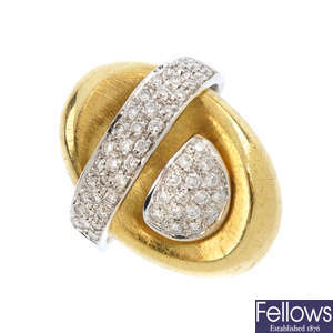 An 18ct gold diamond abstract ring.