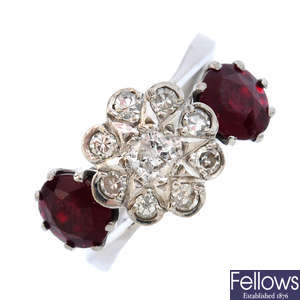 A diamond and garnet-topped-doublet crossover ring.