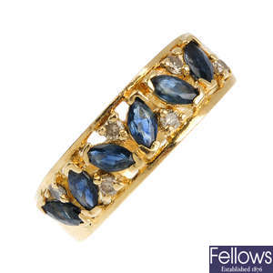 An 18ct gold sapphire and diamond band ring.
