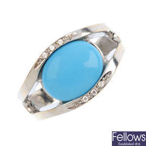 An 18ct gold reconstituted turquoise and diamond ring.