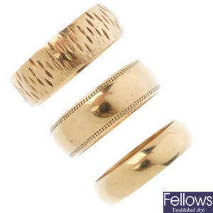 Four 9ct gold band rings.