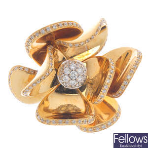 A diamond flower dress ring.