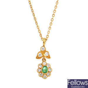 An emerald and diamond pendant, with an 18ct gold chain.