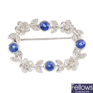 An 18ct gold sapphire and diamond brooch.