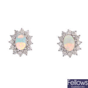 A pair of 18ct gold and diamond cluster earrings.