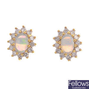 A pair of 18ct gold opal and diamond earrings.