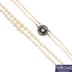 A cultured pearl two-row necklace, with diamond and sapphire clasp. 
