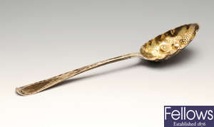 A George III silver berry spoon, two George IV silver teaspoons, etc.