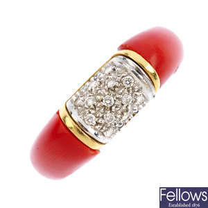 A diamond and coral band ring.