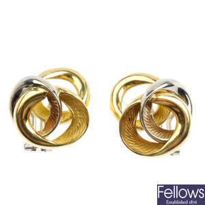 A pair of bi-colour earrings.