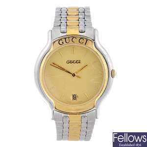 GUCCI - a gentleman's bi-colour 8000M bracelet watch with a Gucci 9000M bracelet watch.