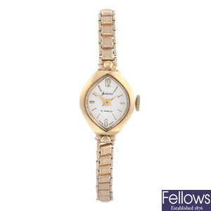 ACCURIST - a lady's 9ct yellow gold bracelet watch with a 9ct gold wrist watch and a lady's Longines bracelet watch.