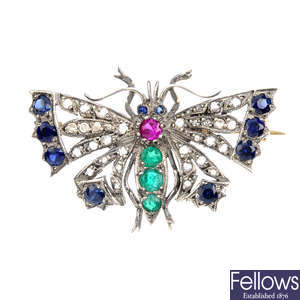 A gem-set and diamond butterfly brooch.