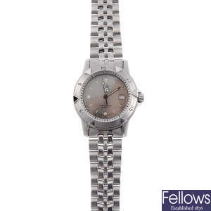TAG HEUER - a gentleman's stainless steel 1500 Series bracelet watch.