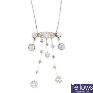 An early 20th century diamond modified negligee pendant, on chain.