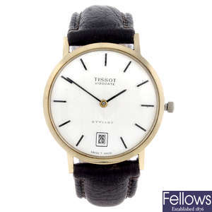 TISSOT - a gentleman's 9ct yellow gold Visodate wrist watch.
