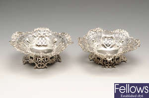 A pair of late Victorian silver bonbon dishes by William Comyns & Sons.