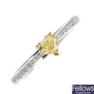 A 18ct gold 'yellow' diamond and diamond ring.