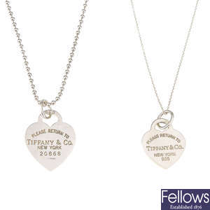 TIFFANY & CO. - two pendants and a ring.
