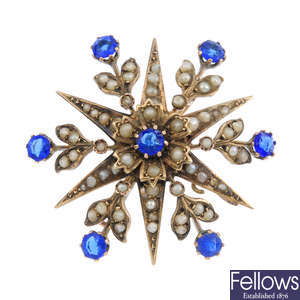 An early 20th century 9ct gold split pearl and paste star pendant.