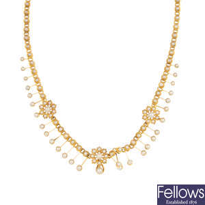 A late Victorian gold split and seed pearl necklace.