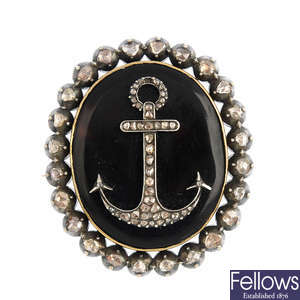 A late Victorian silver and gold diamond and tortoiseshell brooch.
