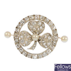 A late Victorian silver and gold diamond and cultured pearl three leaf clover brooch.