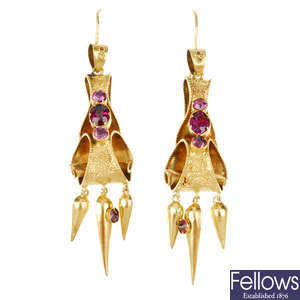 A pair of garnet earrings.