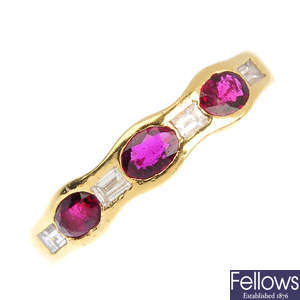 An 18ct gold synthetic ruby and diamond band ring.
