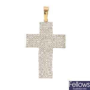 A diamond cross pendant. 